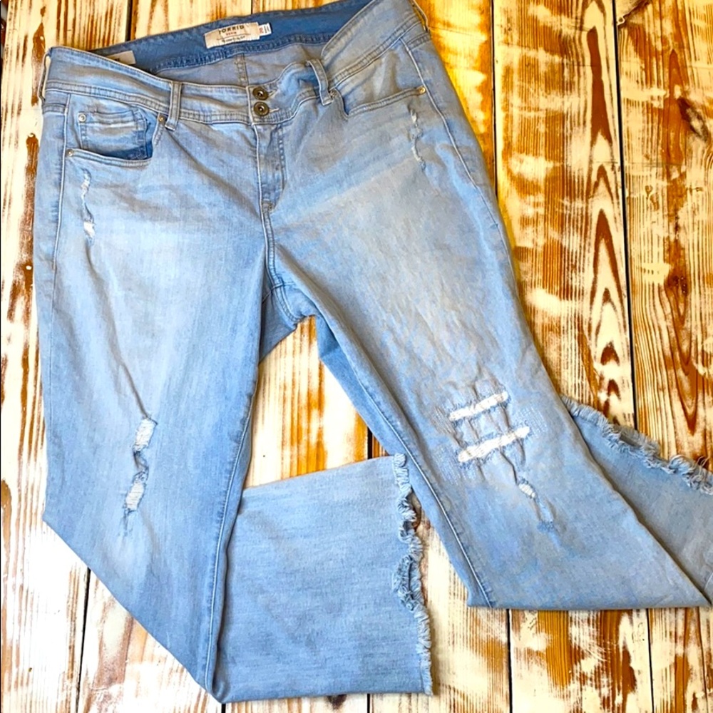 Torrid Light Wash Blue Denim Flare Fray Hem Jeans